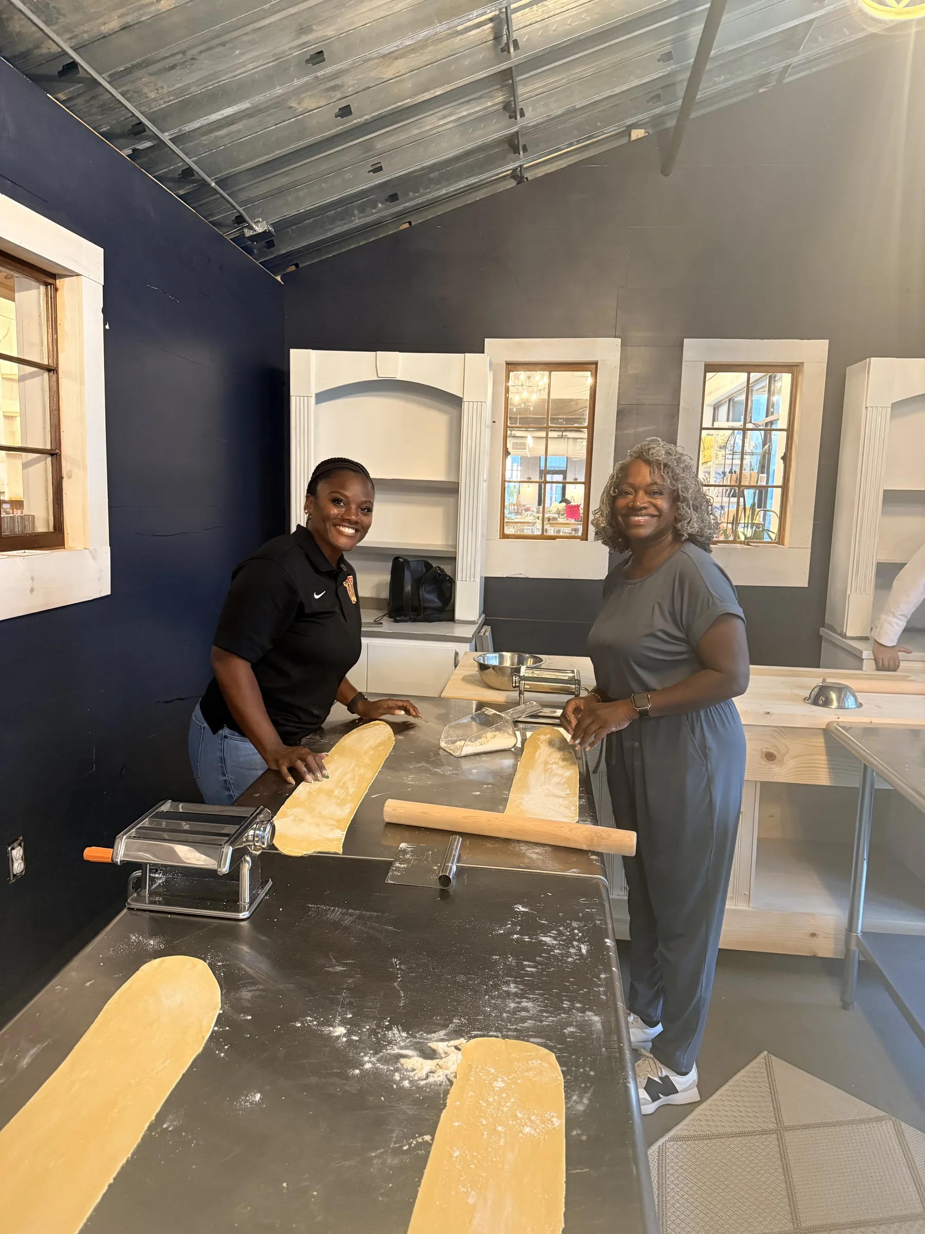 Guests making pasta